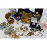 A LARGE ASSORTMENT OF COSTUME JEWELLERY including cuff links, rings, brooches, necklaces, bangles,