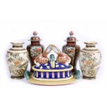 A PAIR OF JAPANESE SATSUMA EARTHENWARE VASES, 26cm high; a pair of Imari vases and covers; and a