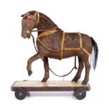 A TAXIDERMY AND PAPIER MACHE MINIATURE HORSE MODEL on plinth 18cm x 17cm