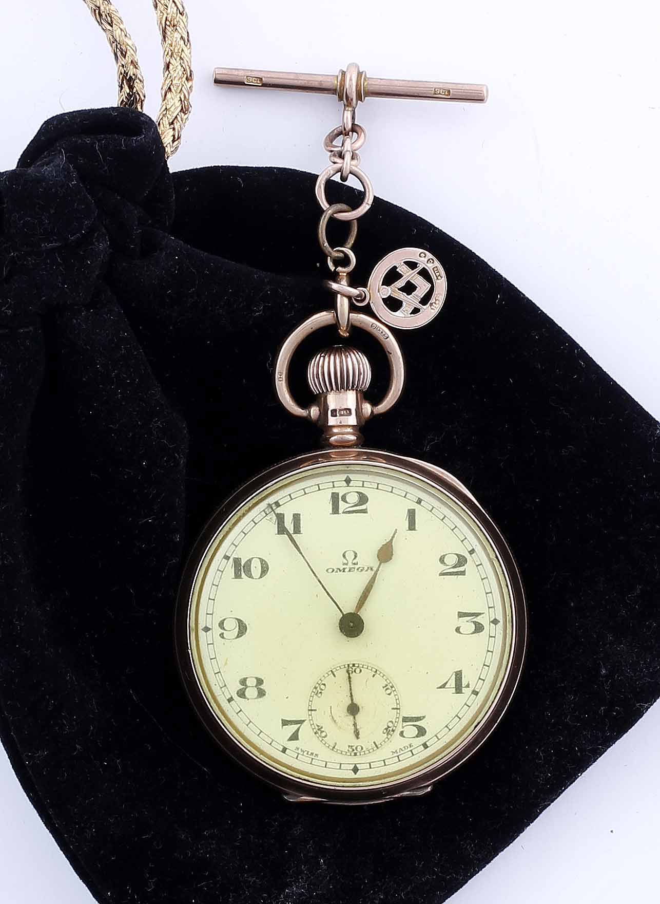 A 9 CARAT ROSE GOLD CASED OMEGA POCKET WATCH with Masonic gold talisman on the chain