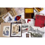 A LARGE QUANTITY OF EPHEMERA and other items to include postcards, souvenir albums, a 1952 copy of