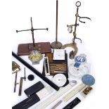 A SLIDE RULE by A W Faver, a part antique balance scale, a 19th century retort stand, various