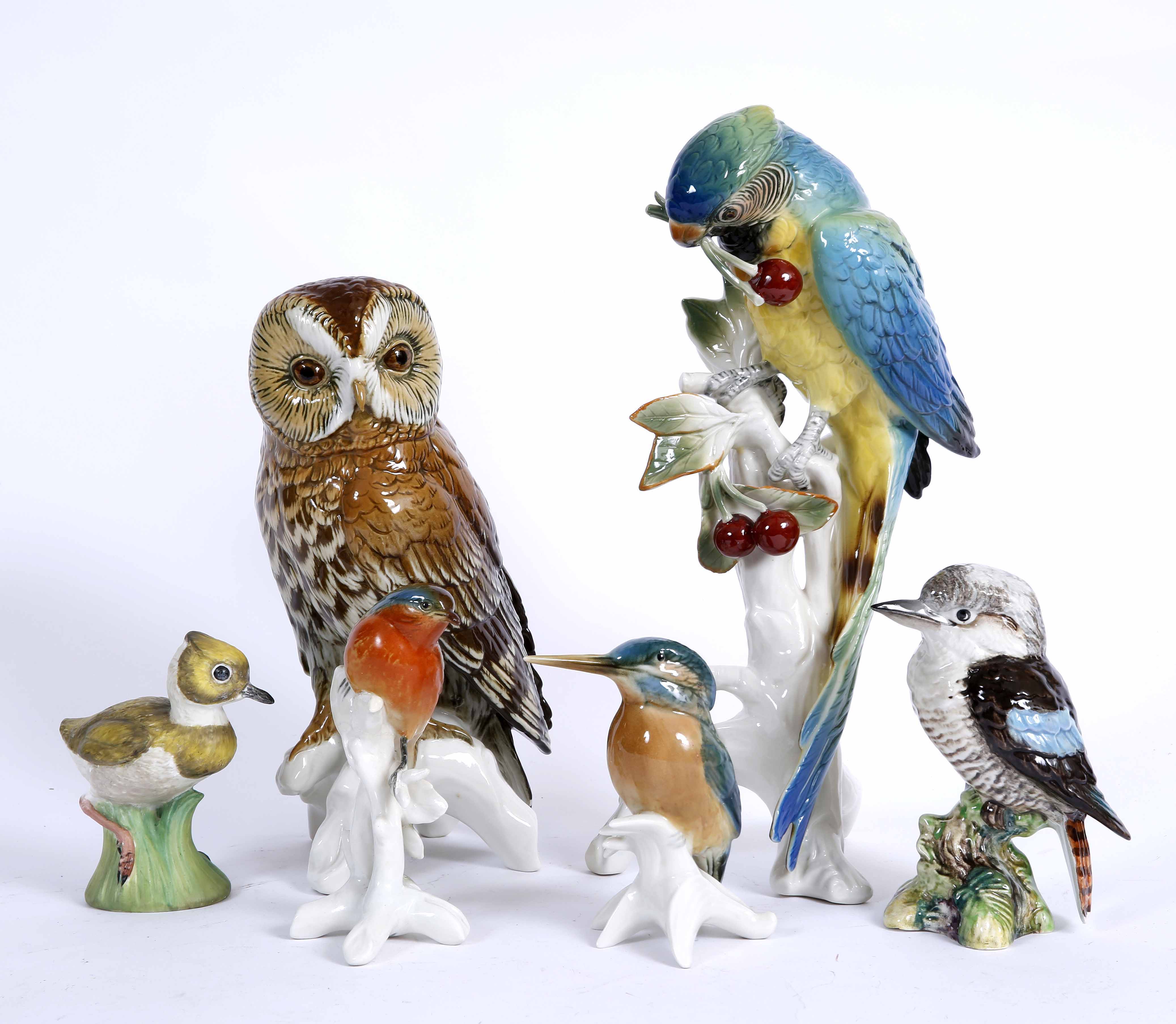 A ROUDOLSTADT VOLKSTEDT KARL ENS PORCELAIN MODEL of a parrot 31cm high together with three further