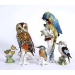 A ROUDOLSTADT VOLKSTEDT KARL ENS PORCELAIN MODEL of a parrot 31cm high together with three further