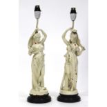 A PAIR OF VICTORIAN PAINTED METAL LAMPS of classical female figure form, 45cm high