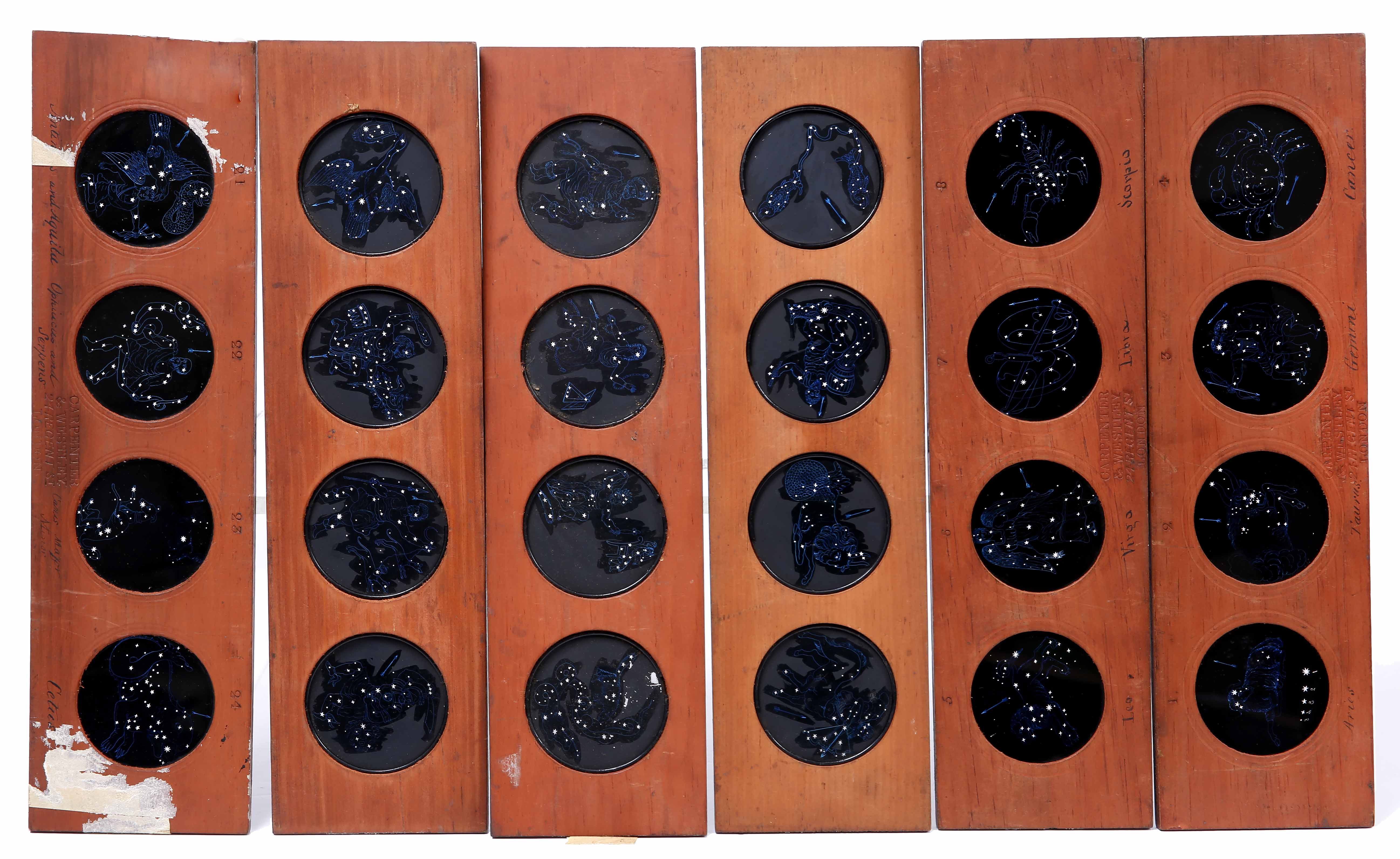 A GROUP OF NINE LONG MAGIC LANTERN SLIDES to include three with mechanical elements, others