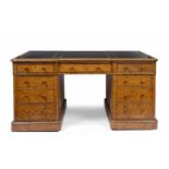 A VICTORIAN WALNUT PEDESTAL BREAK FRONT PARTNERS DESK with black leather inset top which measures