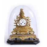 A FRENCH GILT METAL MANTLE CLOCK, white enamel dial, striking drum movement under a glass dome,
