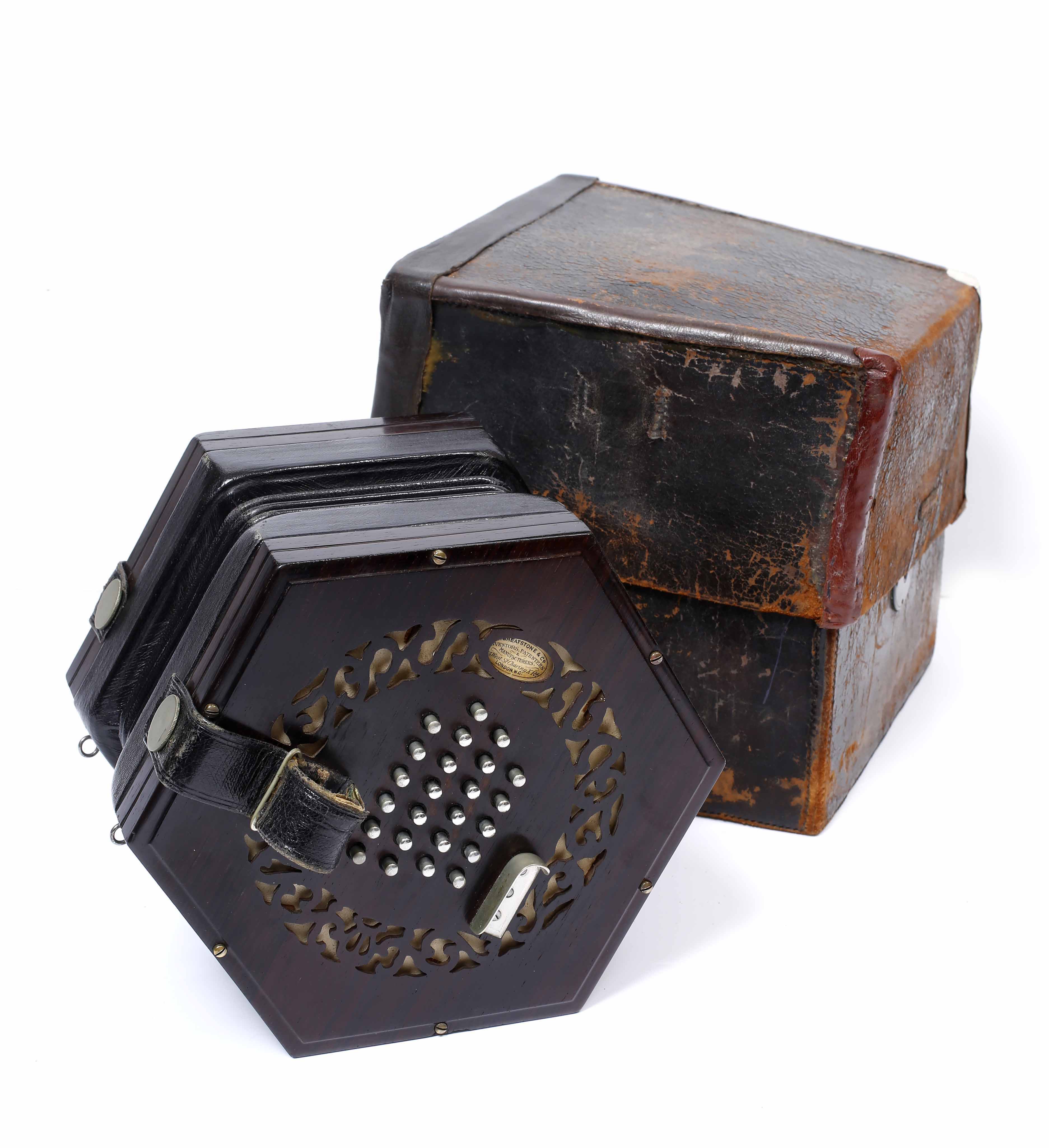 A ROSEWOOD CONCERTINA by Wheatstone & Co., with forty eight buttons and numbered 20140