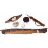 TWO OLD BIRCH BARK MINIATURE CANOES, miniature bow and arrow and quiver, a possibly ancient clay