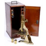 A 19TH CENTURY BRASS MICROSCOPE by M Pillicher London, number 1489, 34cm high complete with fitted