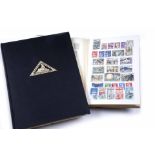 AN ALBUM OF VICTORIAN AND LATER STAMPS together with a book on the Triangular stamps of Cape of Good