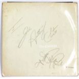 BEATLES WHITE ALBUM numbered 0581648 inscribed to John Anthony Chester and signed by The Beatles