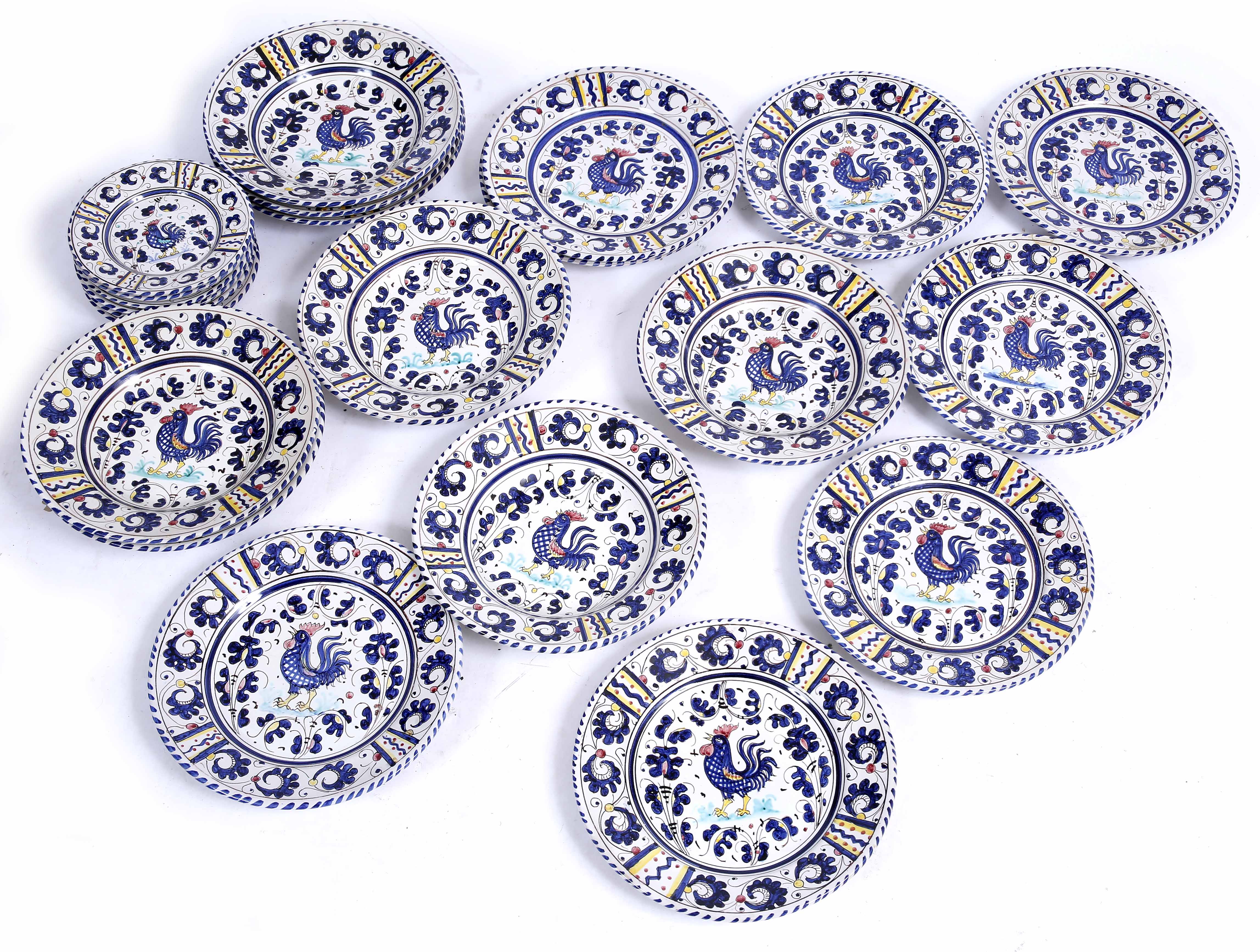 A MODERN DERUTA POLYCHROME POTTERY DINNER SERVICE of twenty two pieces, 24cm plates