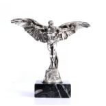 AFTER COLIN GEORGE, a nickel plated car mascot representing Icarus with artists signature and