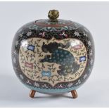 A Japanese cloisonne vase and cover Meiji period decorated with panels of butterflies, mythical