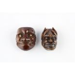 A wood Noh netsuke mask of Hannya 19th Century signed Shuzan, with pierced eyes and mouth and a mask