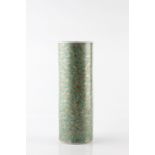 A Japanese green cylindrical brush stand late 19th Century decorated allover with flying cranes,