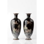 A pair of Japanese cloisonne vases Meiji period decorated with flying birds among bulrushes, each