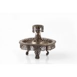 An Indian filigree silver candle stand circa 1900 of circular form, 10.5cm