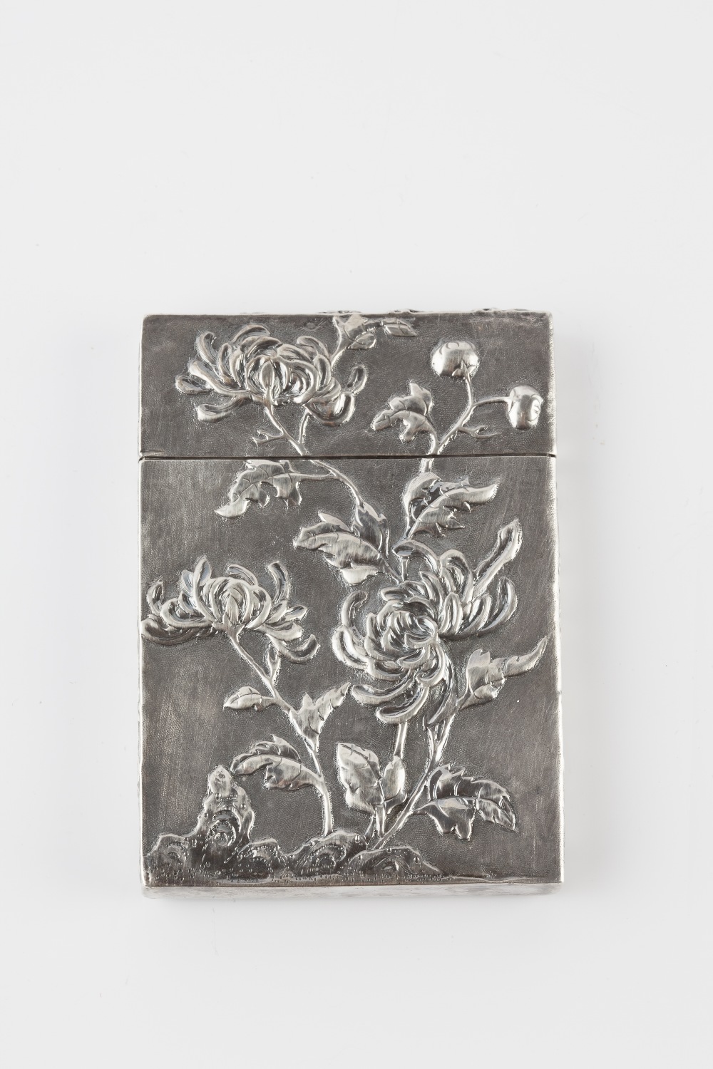 A Chinese silver rectangular visiting card case late 19th Century decorated with chrysanthemums,