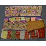 Two Indian portieres a silk long shawl and a few other pieces