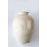 A Japanese porcelain vase late Meiji period signed, Seido, of ovoid form with white glazed low