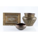 A collection of Islamic brass and copper ware 19th century to include a silver metal inlaid tray,