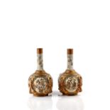 A pair of Japanese Satsuma bottle neck vases Meiji period signed Kinkozan, with gilt enamel panels