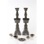 A pair of Chinese pewter stepped candlesticks circa 1900 made in two sections of square form, 48cm