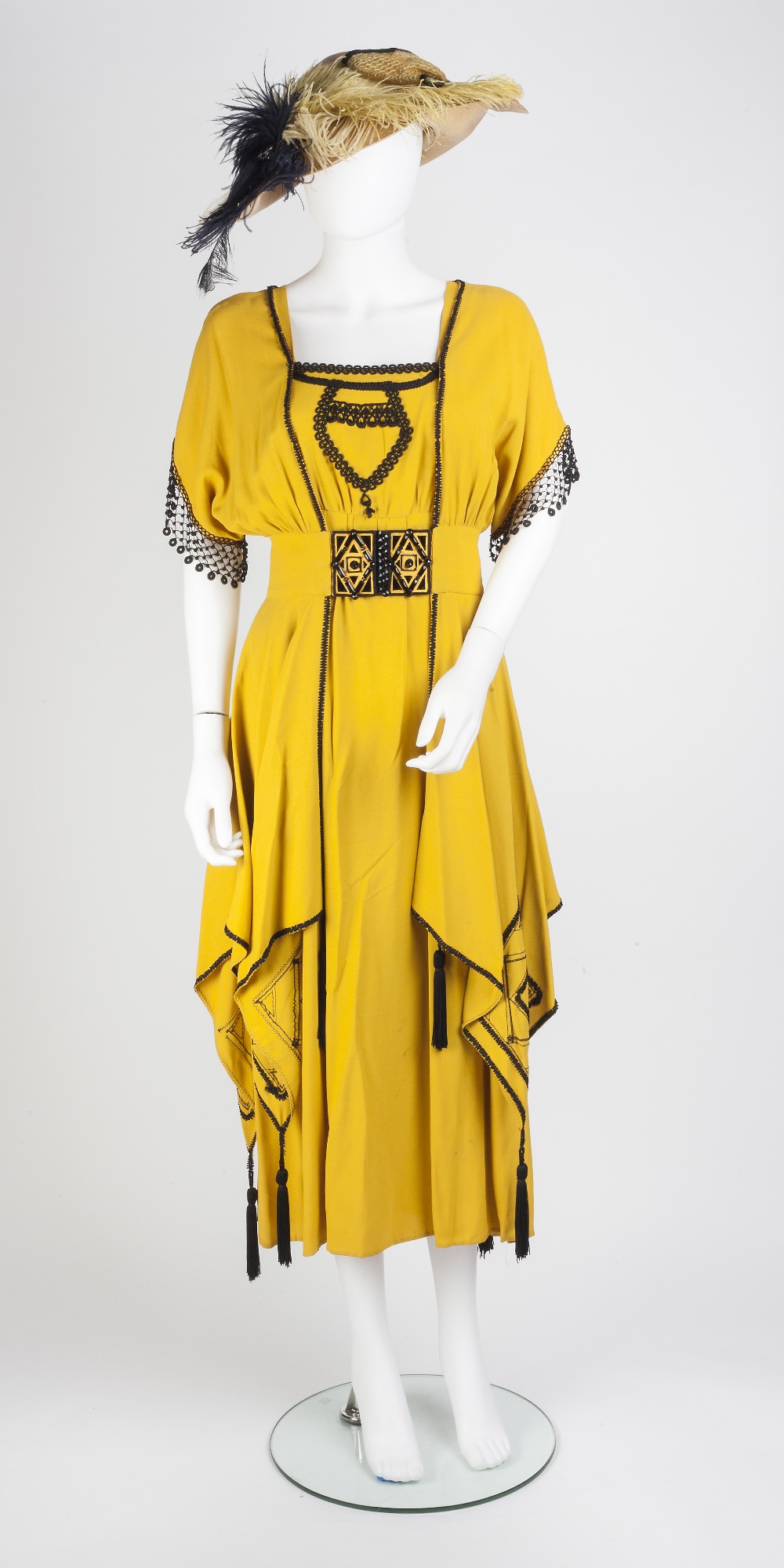 A 1960s yellow crepe dress and feather trimmed hat theatrical costume worn by Judi Dench, the