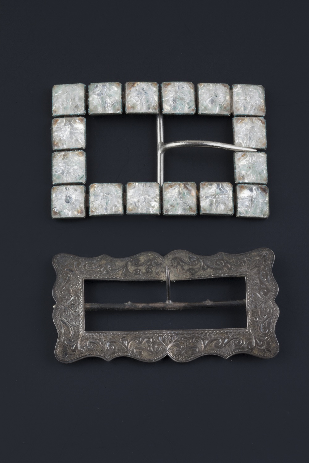 A collection of assorted buckles, to include a late Victorian silver buckle, of shaped rectangular