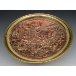 A VICTORIAN BRASS AND COPPER EMBOSSED TAZZA with classical figure decoration in an ancient