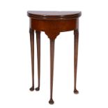 AN 18TH CENTURY STYLE MAHOGANY DEMI-LUNE FOLD OVER OCCASIONAL TABLE of small proportions with gate