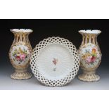 AN ENGLISH PORCELAIN BASKET WORK PLATE with simple floral swag decoration and red anchor mark verso,