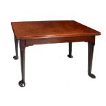 AN 18TH CENTURY MAHOGANY RECTANGULAR TEA TABLE with swivel top, tapering legs and pad feet, 81cm