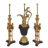 A PAIR OF REPRODUCTION REGENCY STYLE GILT METAL TABLE LAMPS, each with three winged female masks