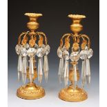 A PAIR OF LATE 19TH CENTURY GILT METAL TABLE LUSTRES, having removable drip pans and hung with