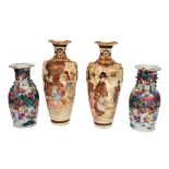 A PAIR OF LATE 19TH CENTURY CANTONESE FAMILLE ROSE VASES painted with warriors in landscapes and