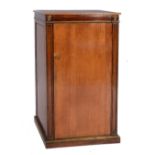 AN EDWARDIAN MAHOGANY AND GILT METAL MOUNTED LIBRARY CABINET, the interior fitted four shelves