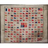 A LARGE 19TH/EARLY 20TH CENTURY SILKWORK PANEL displaying the Flags and Ensigns of Countries,