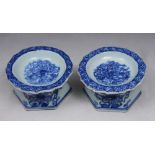 A PAIR OF CHINESE BLUE AND WHITE PORCELAIN SALTS on hexagonal bases, 8cm diameter