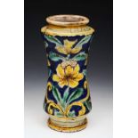 AN 18TH CENTURY ITALIAN MAIOLICA ALBARELLO of waisted form with yellow lily decoration on a