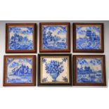 A SET OF FIVE DELFT BLUE AND WHITE TILES, painted with landscapes; and another similar, painted with