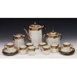 A LIMOGES PORCELAIN COFFEE SERVICE consisting of nineteen pieces including a coffee pot, sucrier,