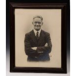 A FRAMED PHOTOGRAPH of Lord Nuffield. signed "sincerely yours W.R. Morris."