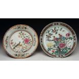 AN 18TH CENTURY CHINESE PORCELAIN PLATE decorated oriental pheasants in famille rose enamels, 31.5cm