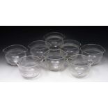 A SET OF EIGHT 19TH CENTURY GLASS FINGER BOWLS with hobnail and fluted decoration, double lipped,