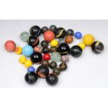 A VARIED COLLECTION OF ANTIQUE STONE AND GLASS MARBLES (38)