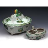 A FRENCH FAIENCE TUREEN AND COVER with green and yellow glaze foliate decoration and fruit finial,